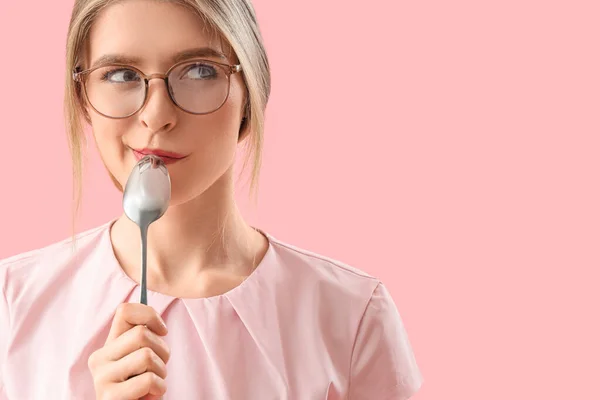 Thoughtful Young Woman Spoon Pink Background Closeup — Stock Photo, Image