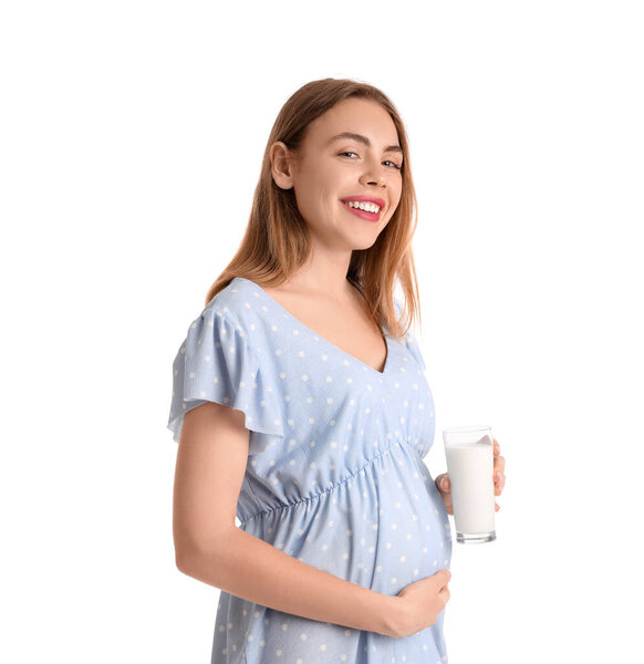Young pregnant woman with milk on white background