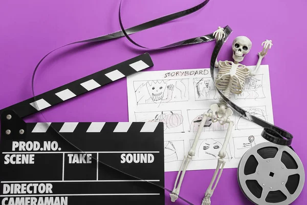 Clapperboard Avec Bobine Film Storyboard Squelette Sur Fond Violet Fête — Photo