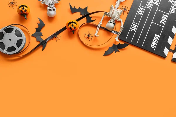Clapperboard Avec Bobine Film Décor Halloween Différent Sur Fond Orange — Photo