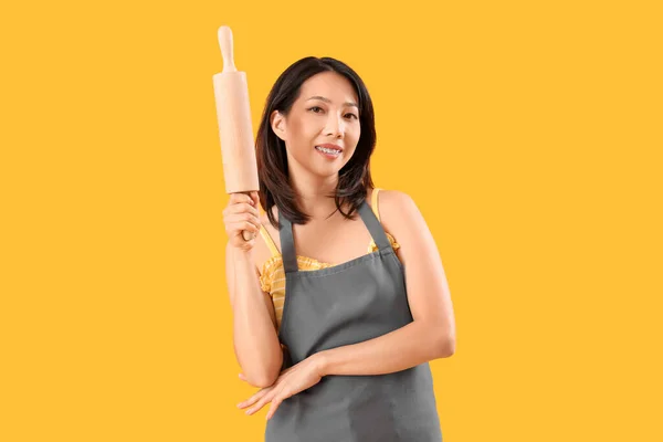 Young Beautiful Asian Woman Wooden Rolling Pin Yellow Background — Stock Photo, Image