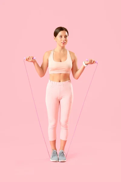 Sporty Young Woman Jumping Rope Pink Background — Stock Photo, Image