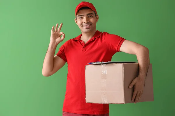Male Courier Parcel Showing Green Background — Stock Photo, Image