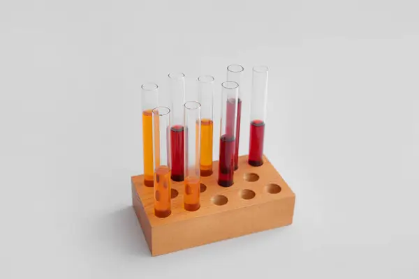 Test Tubes Colorful Samples Wooden Stand Grey Background — Stock Photo, Image