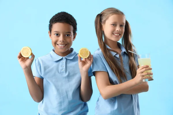 Little Children Glass Fresh Citrus Juice Lemon Slices Blue Background — Stock Photo, Image