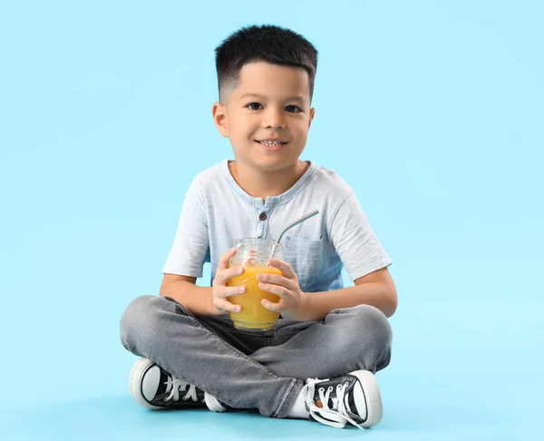 Little Asian Boy Mason Jar Fresh Citrus Juice Sitting Blue — Stock Photo, Image