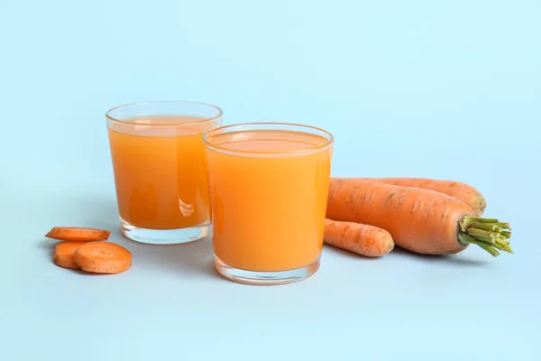 Glasses Fresh Carrot Juice Blue Background — Stock Photo, Image