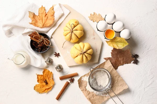 stock image Pumpkin shaped buns and ingredients on white background