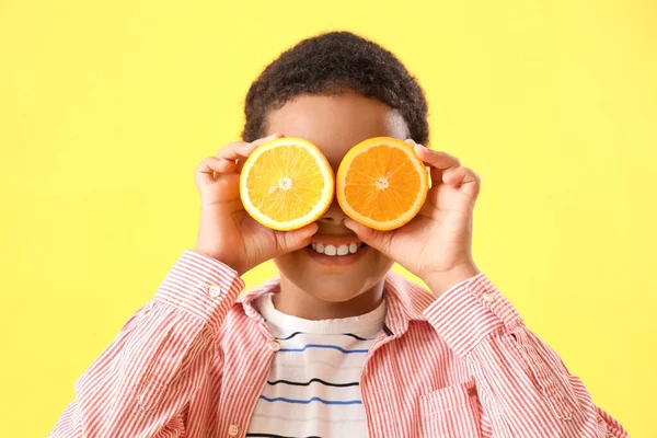 Little African American Boy Slices Orange Yellow Background — Stock Photo, Image