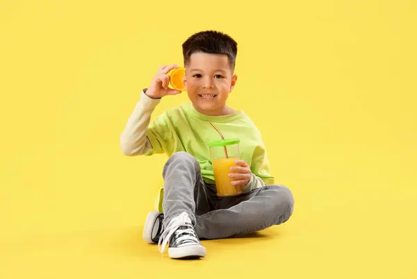 Little Asian Boy Cup Fresh Citrus Juice Orange Slice Sitting — Stock Photo, Image