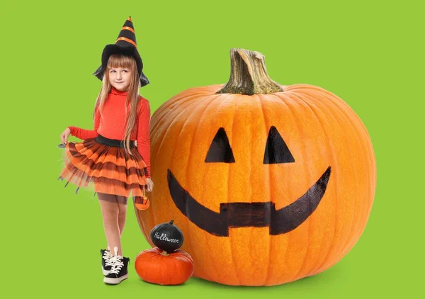 Cute Little Girl Dressed Witch Halloween Pumpkins Green Background — Stock Photo, Image