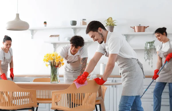 Young Janitors Cleaning Kitchen — Fotografia de Stock