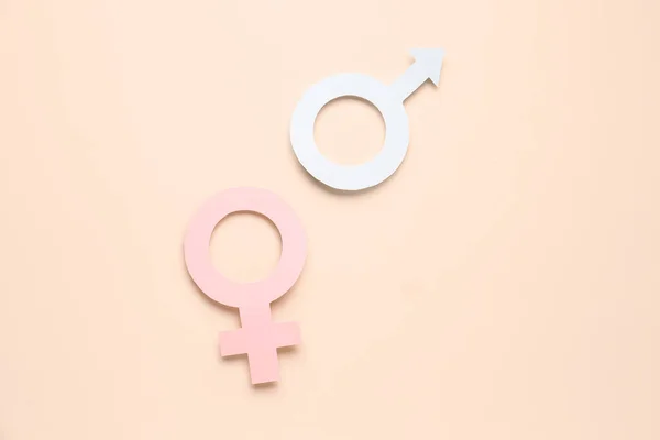 Símbolos Papel Fêmea Macho Sobre Fundo Laranja Pálido — Fotografia de Stock