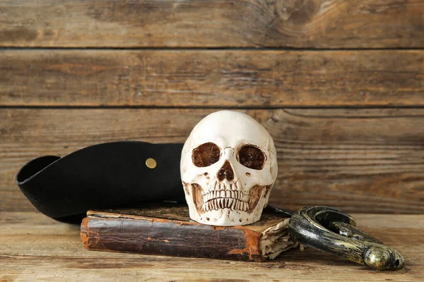 Human Skull Pirate Hat Old Manuscripts Sword Brown Wooden Background — Stock Photo, Image
