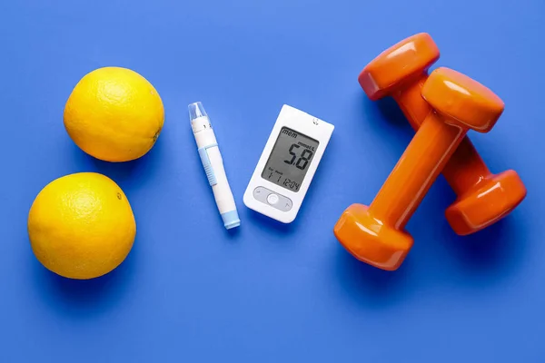 Glucometer Lancet Halters Sinaasappels Blauwe Achtergrond Diabetes Concept — Stockfoto