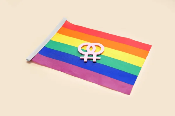Hbtq Regnbåge Flagga Med Kvinnliga Könssymboler Beige Bakgrund — Stockfoto