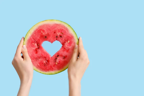 Woman Holding Slice Ripe Watermelon Heart Blue Background — Stock Photo, Image