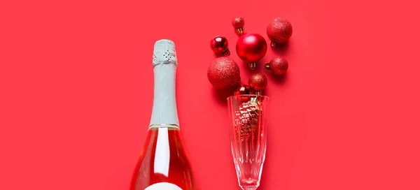 Beautiful New Year Composition Bottle Champagne Glass Baubles Red Background — Stock Photo, Image