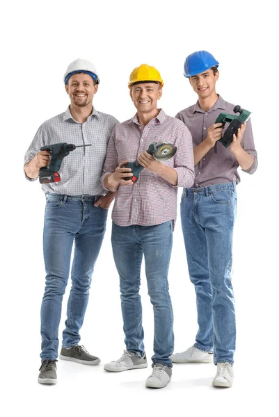 拥有白色背景工具的男性建筑工人小组 — 图库照片