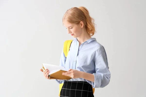 Female Student Backpack Reading Book Grey Background — Stock Photo, Image