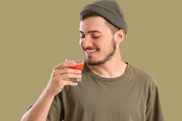 Young Man Glass Tomato Juice Green Background Closeup — Stock Photo, Image
