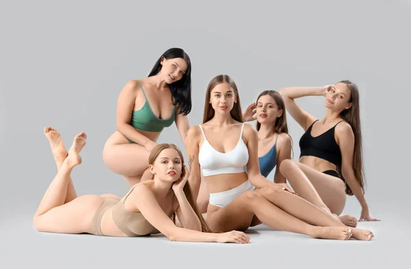 Many Beautiful Women Underwear Light Background — Stock Photo, Image
