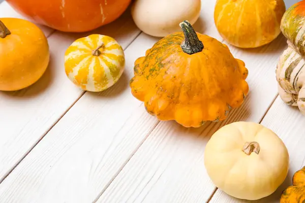 Different Fresh Pumpkins White Wooden Background — Stock Photo, Image