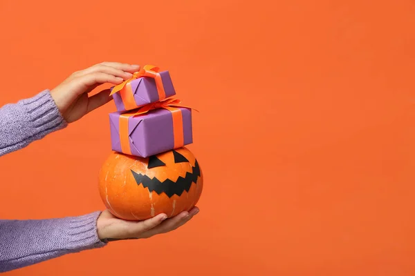 Female Hands Gift Boxes Halloween Pumpkin Orange Background — Stock Photo, Image