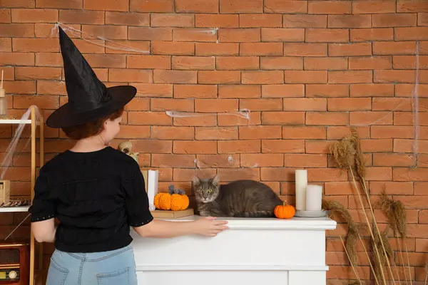 Young Woman Witch Hat Cute Cat Fireplace Home — Stock Photo, Image