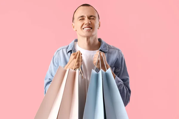 Young Man Shopping Bags Pink Background — Stock Photo, Image