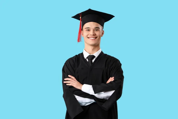 Mężczyzna Absolwent Student Niebieskim Tle — Zdjęcie stockowe