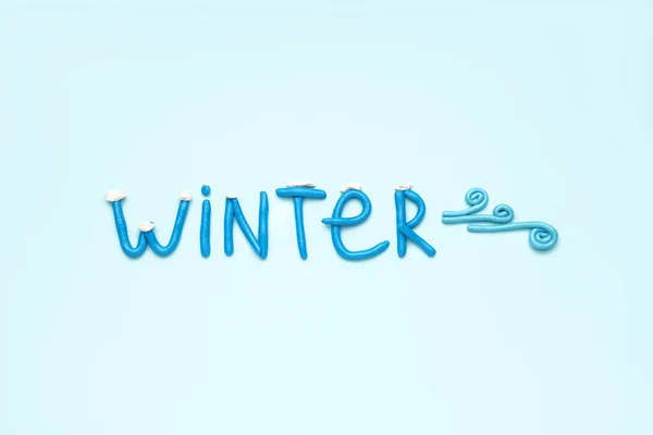 Word Winter Made Play Dough Light Blue Background — Stock Photo, Image