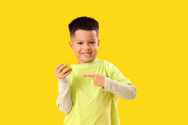 Little Asian Boy Pointing Fresh Lime Yellow Background — Stock Photo, Image
