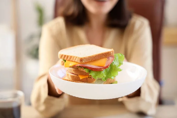 Woman Holding Plate Tasty Sandwich Office Closeup — Stock Photo, Image