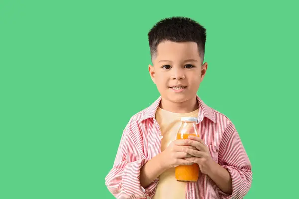 Little Asian Boy Bottle Fresh Citrus Juice Green Background — Stock Photo, Image