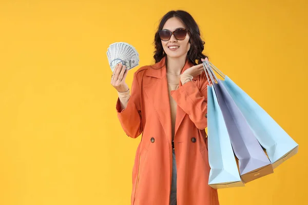 Young Asian Woman Fall Clothes Money Shopping Bags Yellow Background — Stock Photo, Image