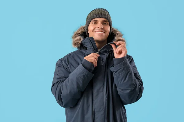 Young Man Warm Parka Blue Background — Stock Photo, Image