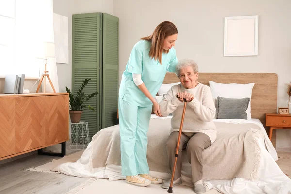 Female Caregiver Senior Woman Bedroom — Stock Photo, Image