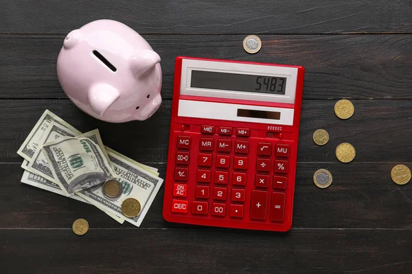 Calculator Piggy Bank Money Black Wooden Background — Stock Photo, Image