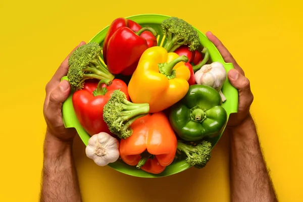 Man Holding Colander Different Fresh Vegetables Yellow Background — Stock Photo, Image