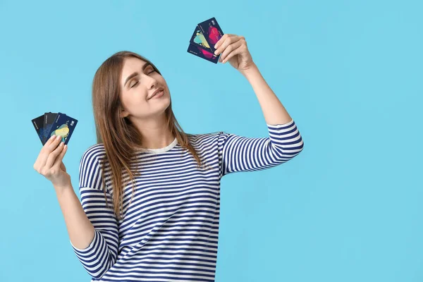 Young Woman Credit Cards Blue Background — Stock Photo, Image