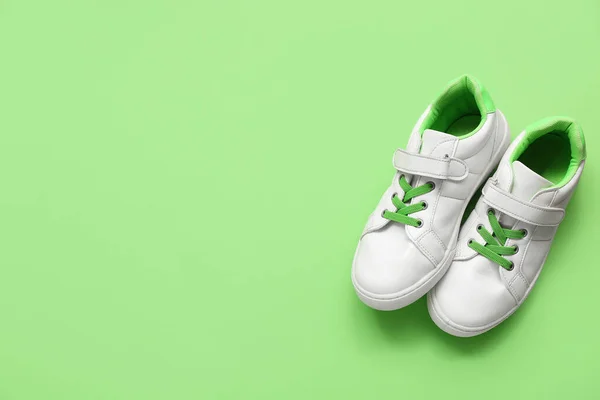 Pair Stylish Child Sneakers Green Background — Stock Photo, Image
