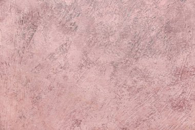 Arkaplan olarak pembe grunge dokusunun yakın görünümü