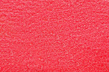 Mercan zemin üzerinde parıltı olan pembe kumun yakın görüntüsü