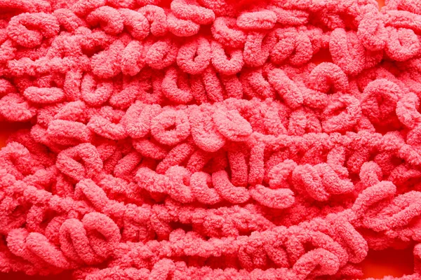 Closeup view of coral knitted cloth