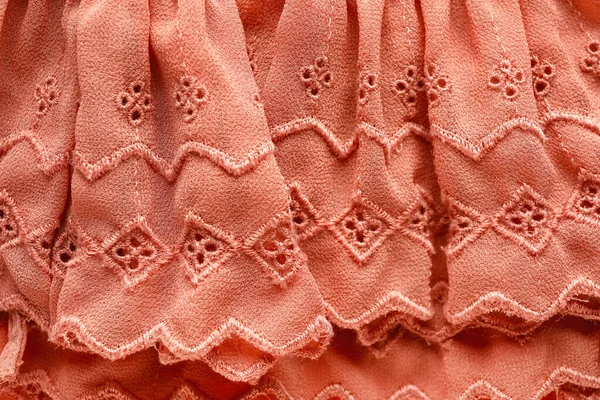 刺繍されたサンゴの衣類のクローズアップビュー — ストック写真