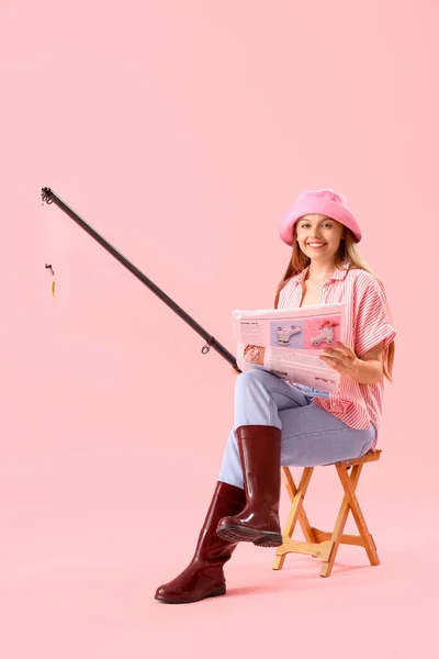 Happy Young Woman Fishing Rod Newspaper Pink Background — Stock Photo, Image