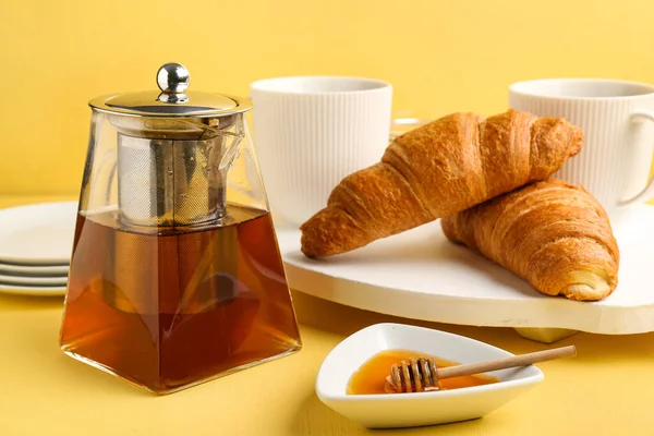 Glass Teapot Tea Honey Croissants Yellow Background — Stock Photo, Image