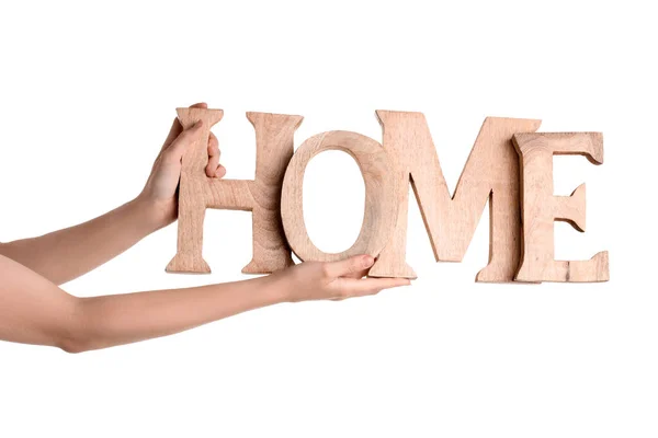 Female Hands Holding Decorative Word Home White Background — Stock Photo, Image