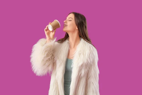 Young Woman Fur Coat Drinking Coffee Purple Background — Stock Photo, Image